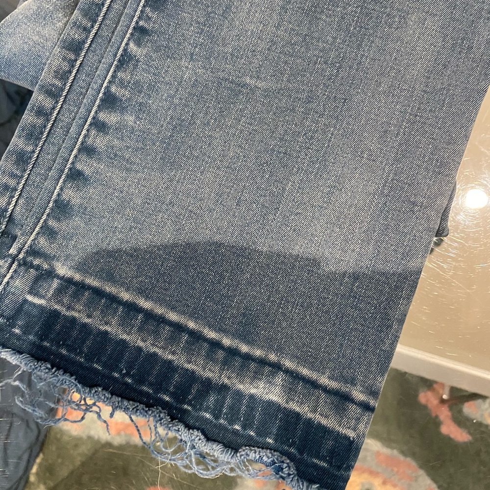 Tory Burch jeans.